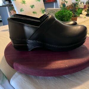 Dansko Black Leather Footwear (see photos of where black peeled)
